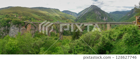 panoramic of Durdevica Tara Bridge, concrete arch bridge over Tara River in northern Montenegro, Europe panoramic of Durdevica Tara Bridge, concrete arch bridge over Tara River in northern Montenegro, Europe 128627746