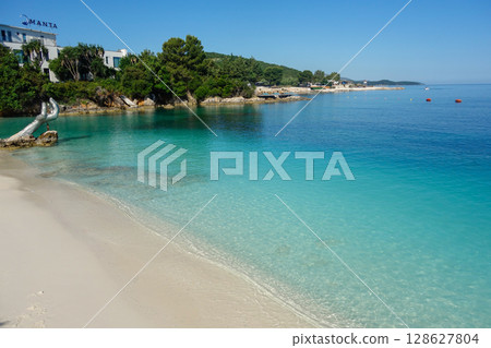 incredible paradise beach in Ksamil, Albanian rivieira, Ionian sea coastline incredible paradise beach in Ksamil, Albanian rivieira, Ionian sea coastline 128627804