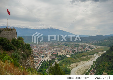 tourists on observation deck of Berat Castle look out over city below. Berat, Albania, Unesco World Heritage Site tourists on observation deck of Berat Castle look out over city below. Berat, Albania, Unesco World Heritage Site 128627841