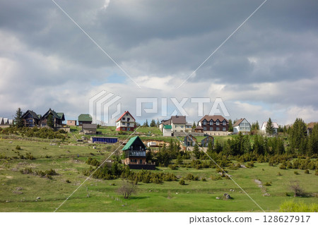 panoramic view of picturesque lodges in countryside of Zabljak, Montenegro 128627917