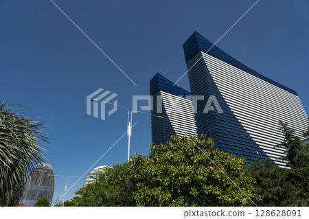 Hotel buildings in Batumi against a clear sky 128628091