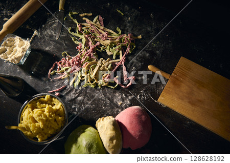 Colorful Homemade Pasta Preparation Featuring Traditional Italian Techniques and Ingredients Colorful Homemade Pasta Preparation Featuring Traditional Italian Techniques and Ingredients 128628192