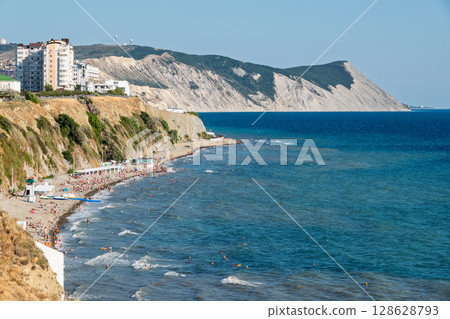 Anapa, Russia - August 01, 2024: High coast beach in Anapa, Russia. Anapa, Russia - August 01, 2024: High coast beach in Anapa, Russia. 128628793