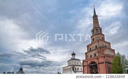The ancient leaning red brick Syuyumbike Tower on the territory of the Kazan Kremlin. Russia 128628849