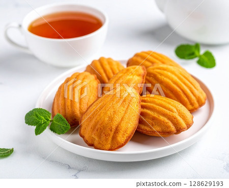 Freshly baked Madeleines for tea time 3 128629193