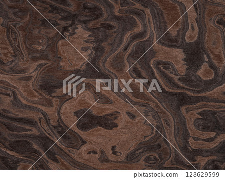 Abstract topography in rich walnut and deep mocha, this walnut burl veneer offers an exquisite play of organic patterns Abstract topography in rich walnut and deep mocha, this walnut burl veneer offers an exquisite play of organic patterns 128629599