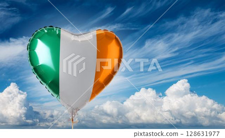 Irish flag heart shaped balloon and blue sky 128631977
