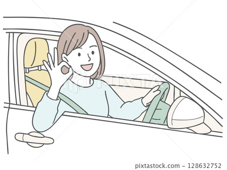 女司機在開車時微笑並做出“OK”手勢 女司機在開車時微笑並做出“OK”手勢 128632752