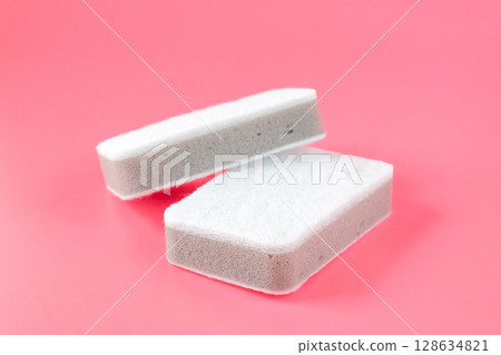 Two cleaning sponges on color background. Two cleaning sponges on color background. 128634821