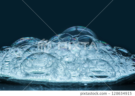 Beautiful soap bubbles of detergent or shower gel. Beautiful soap bubbles of detergent or shower gel. 128634915