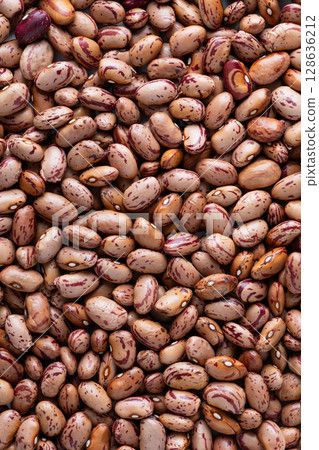 Borlotti beans background close up 128636212