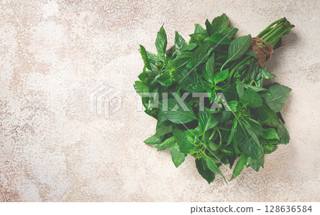bouquet of fresh green basil, on the table, top view, no people, bouquet of fresh green basil, on the table, top view, no people, 128636584