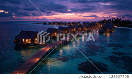The tranquility of the overwater bungalows at dusk 128637706