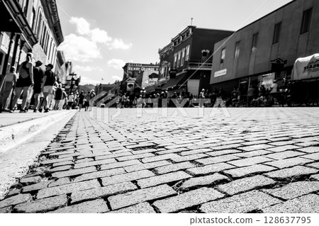 Selective focus on the brick road of historic oldtown Deadwood, South Dakota 128637795