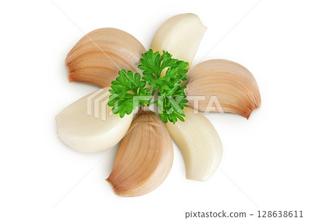 garlic cloves isolated on white background close up. Top view. Flat lay. garlic cloves isolated on white background close up. Top view. Flat lay. 128638611