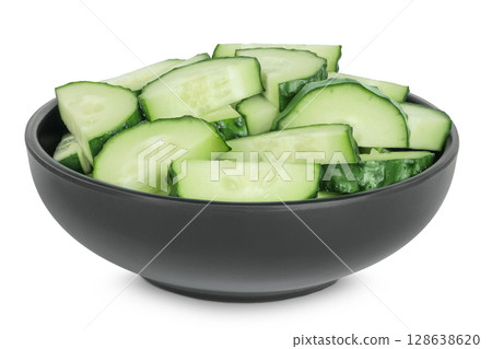 Sliced cucumber in ceramic bowl isolated on white background with full depth of field Sliced cucumber in ceramic bowl isolated on white background with full depth of field 128638620