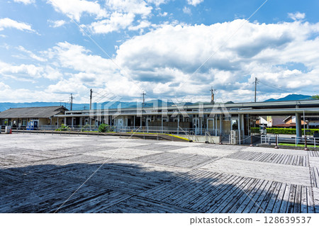 The "Yumae Station Rail Wing" complex adjacent to the Kumakawa Railway's Yumae Station stands out against the blue sky. Yumae Town, Kumamoto Prefecture 128639537