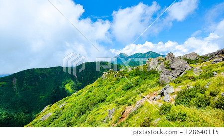Climbing Mt. Myoko in summer (South Peak to North Peak: View of Mt. Hiuchi and Mt. Yake) Climbing Mt. Myoko in summer (South Peak to North Peak: View of Mt. Hiuchi and Mt. Yake) 128640115