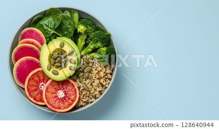 healthy salad with fresh vegetables and fruits 128640944