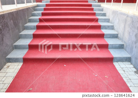 Stunningly Elegant Red Carpet Stairs With Stylish Gray Accents for Grand, Dramatic Entries 128641624