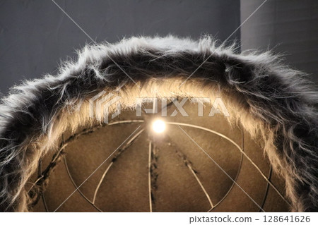 The Illuminated FurTrimmed Hat An Essential and Cozy Accessory for the Winter Season The Illuminated FurTrimmed Hat An Essential and Cozy Accessory for the Winter Season 128641626