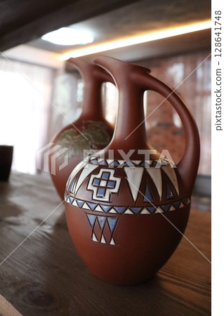 Stunningly Beautiful Handcrafted Clay Pot Featuring Intricate Native Patterns and Designs Stunningly Beautiful Handcrafted Clay Pot Featuring Intricate Native Patterns and Designs 128641748
