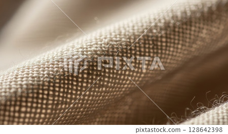 Macro Texture of Woven Fabric Mesh with Intricate Weave Pattern and Soft Lighting 128642398