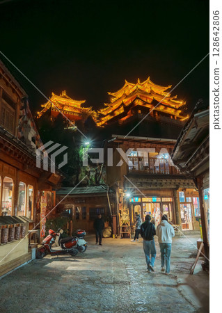 Illuminated pagodas at night in Dukezong Ancient Town, Shangri-La, China 128642806