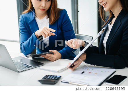 Team business meeting presentation. Hand businesswoman working project in modern office. Team business meeting presentation. Hand businesswoman working project in modern office. 128645195