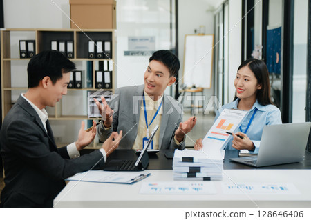 Creative managers crew working with new startup project in office. Asian Team brainstorming. 128646406