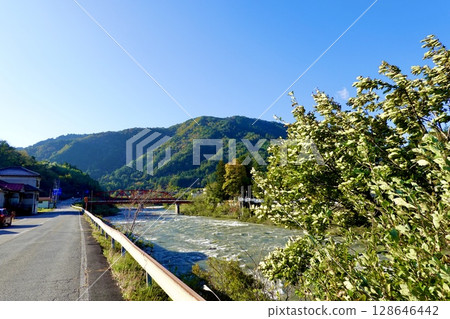 View of the Nezame Power Station downstream from the banks of the Kiso River in Agematsu, Agematsu Town, Kiso District, Nagano Prefecture 128646442