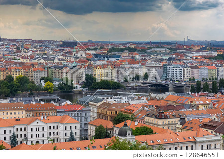 Red roofs of Prague on a foggy day. Prague city view from above. Red roofs of Prague on a foggy day. Prague city view from above. 128646551