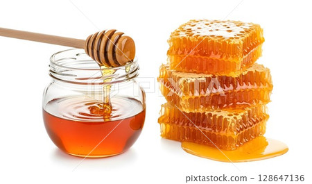 honey in a glass bowl on white background honey in a glass bowl on white background 128647136