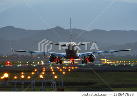 Sendai Airport at dusk, airplane taking off, Natori City, Miyagi Prefecture 128647656