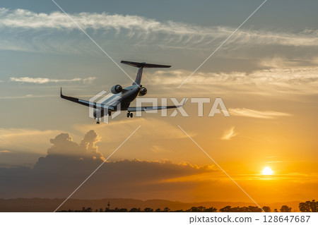 Sendai Airport at dusk, airplane landing, Natori City, Miyagi Prefecture 128647687
