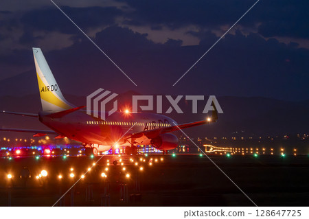 Sendai Airport at night, plane taking off, Natori City, Miyagi Prefecture Sendai Airport at night, plane taking off, Natori City, Miyagi Prefecture 128647725