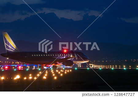 Sendai Airport at night, plane taking off, Natori City, Miyagi Prefecture Sendai Airport at night, plane taking off, Natori City, Miyagi Prefecture 128647727