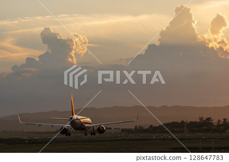 Sendai Airport at dusk, airplane taking off, Natori City, Miyagi Prefecture 128647783