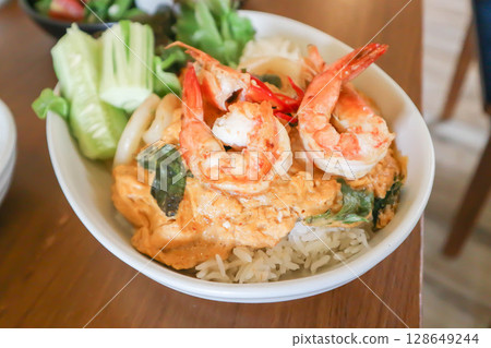 creamy omelet or omelet or omelette or fried egg with shrimp and squid or seafood omelette and rice creamy omelet or omelet or omelette or fried egg with shrimp and squid or seafood omelette and rice 128649244