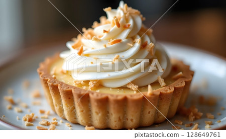Soft Coconut Dessert Tart with Fluffy Topping 128649761