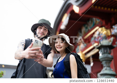 Inbound tourists taking selfies at the shrine Inbound tourists taking selfies at the shrine 128651440
