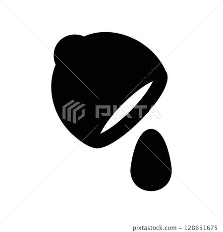 Squeezing a Fresh Lemon Half, Releasing a Single Drop of Juice 128651675