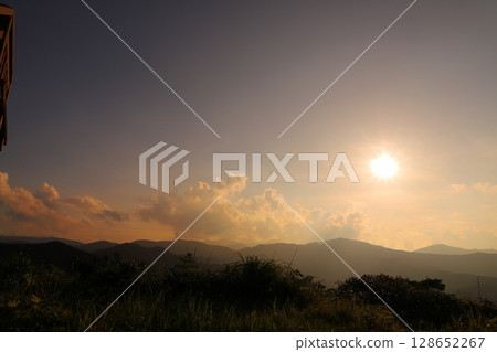 Sunset sky, sunset, clouds, mountains, grassland 128652267
