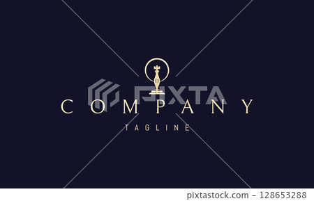 A vector golden logo featuring an abstract image a chess king standing beneath the rising sun. 128653288