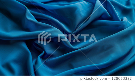 明亮的藍色織物紋理背景 128653382