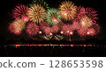 Fireworks that light up the summer night sky 128653598