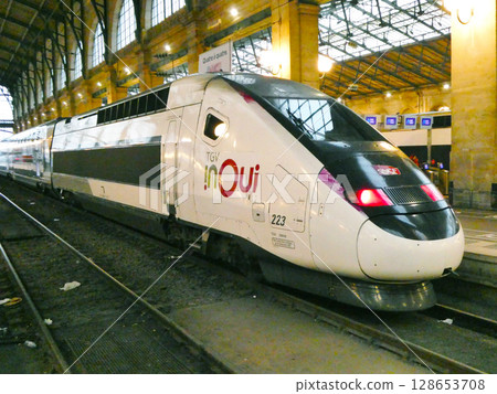 Thunderbird express train arriving at a station at night 128653708