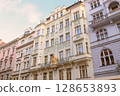Scenic view of traditional houses along a charming street in Prague, Czech Republic. Historic European architecture with colorful facades. 128653893