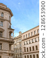 Scenic view of traditional houses along a charming street in Prague, Czech Republic. Historic European architecture. 128653900