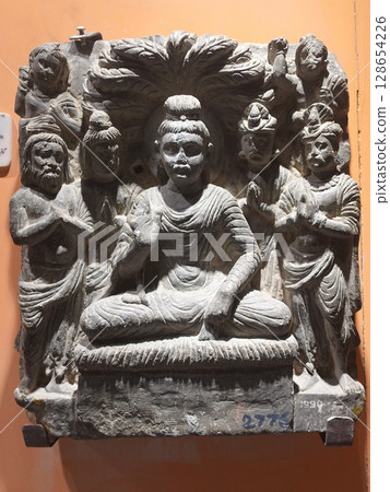 A sculpture of Shakamuni and Brahma asking the Buddha to preach, on display at the Peshawar Museum in Pakistan, the center of Gandhara. A sculpture of Shakamuni and Brahma asking the Buddha to preach, on display at the Peshawar Museum in Pakistan, the center of Gandhara. 128654226